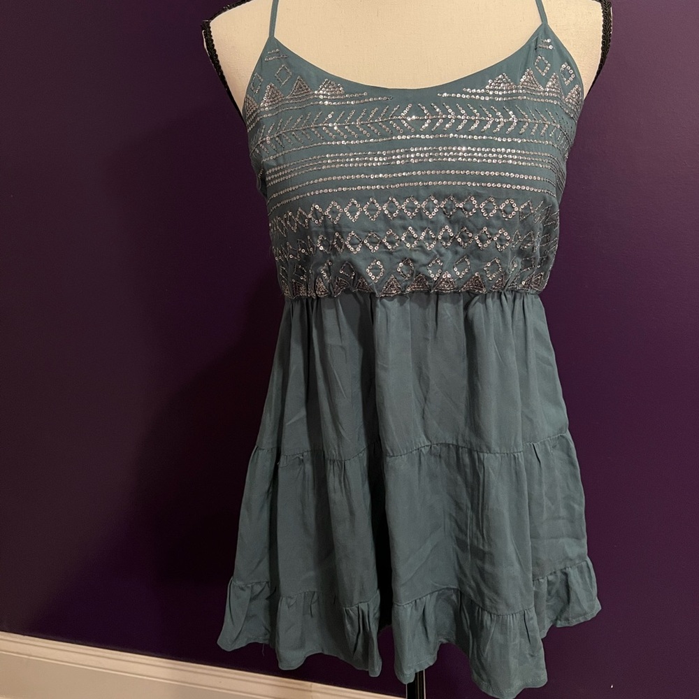 Grayish/blue tank with grey sequenced detailing
